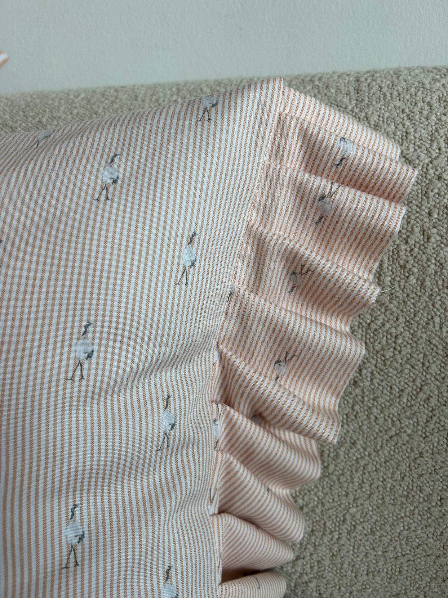 Cushion cover in peach flamingo fabric