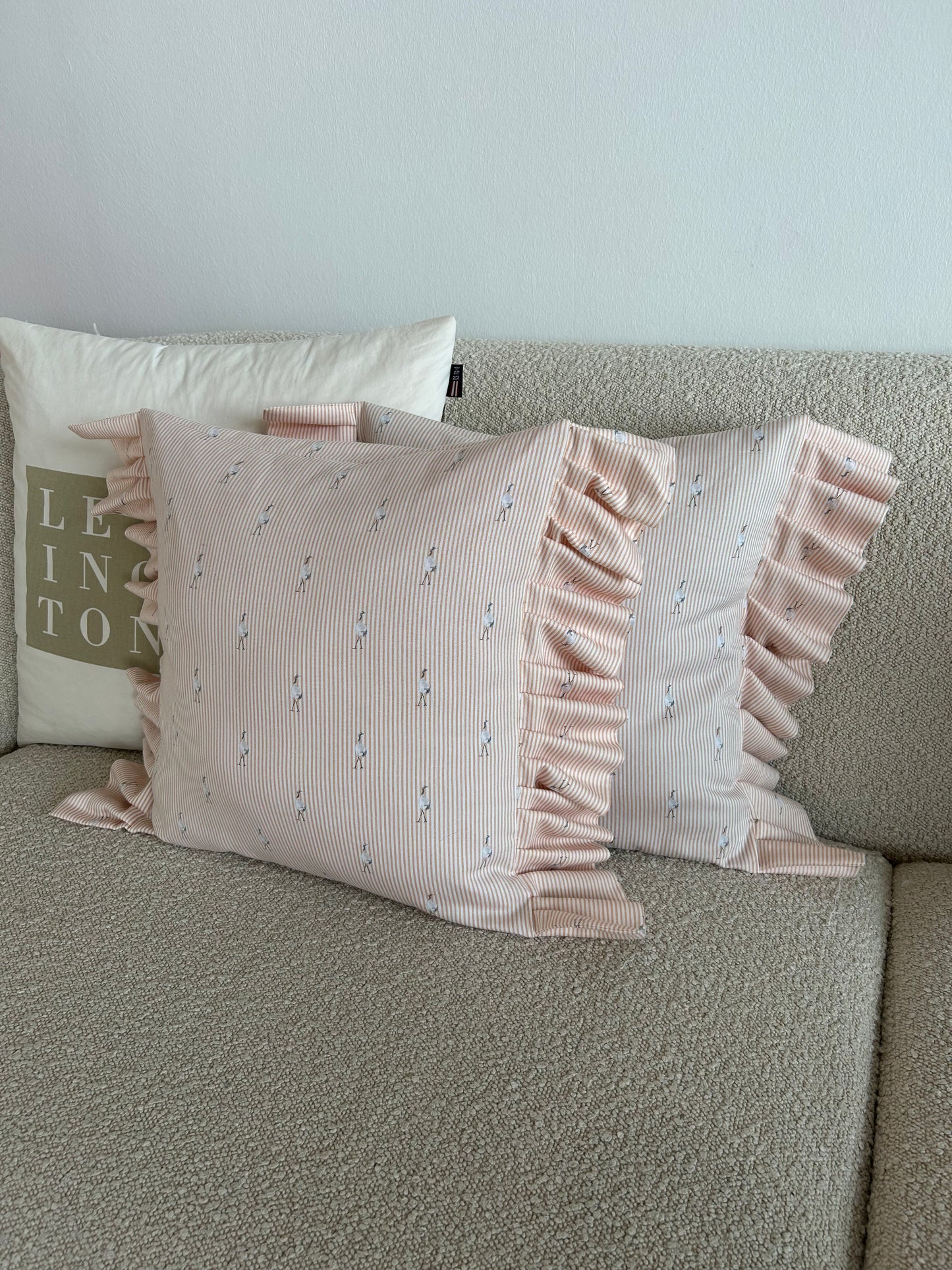 Cushion cover in peach flamingo fabric