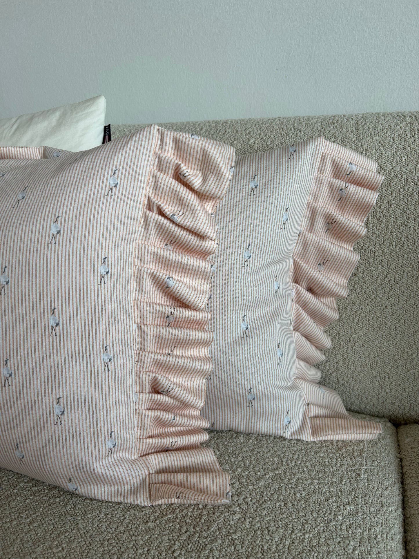 Cushion cover in peach flamingo fabric