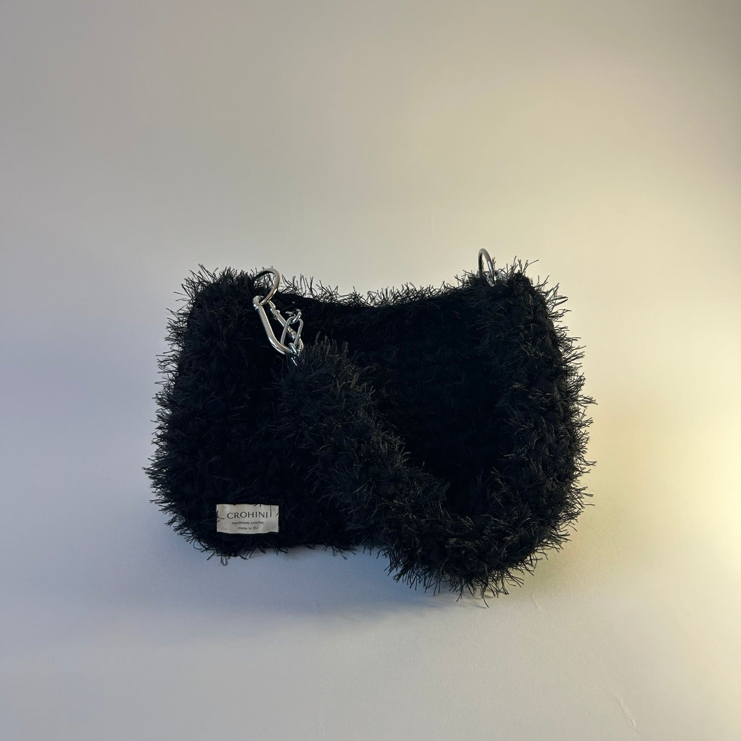Fluffy black JOE crochet bag