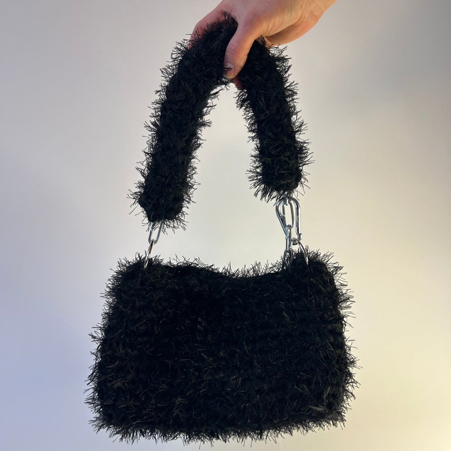 Fluffy black JOE crochet bag