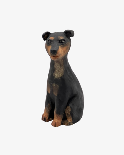 Little black and tan dogsculpture