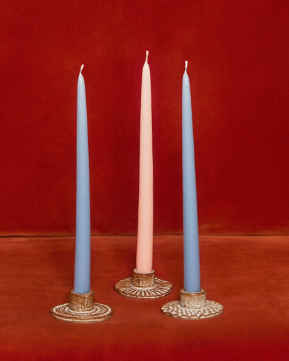 A set of 3 candle holders - white/brown, hand carved pattern