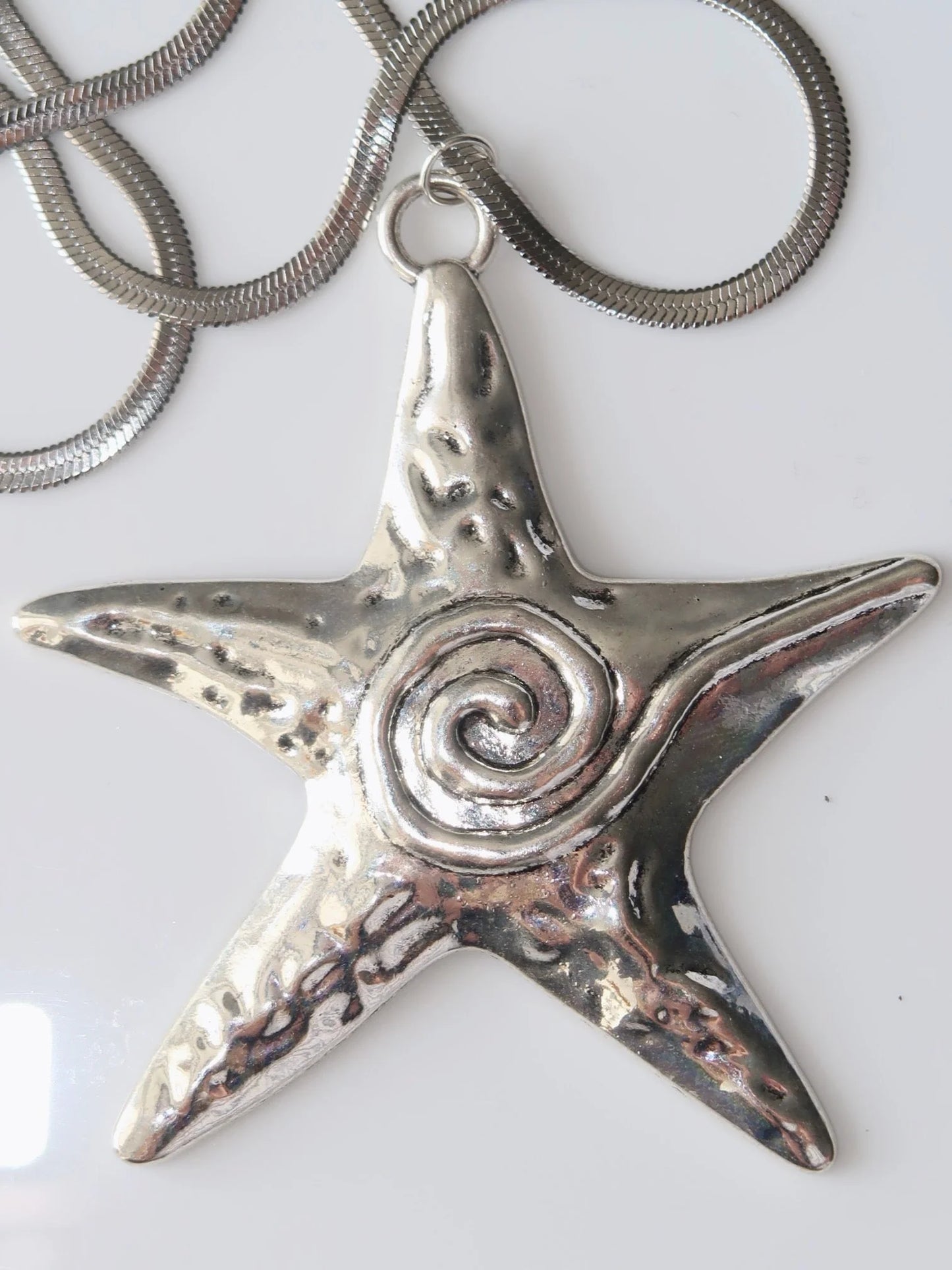 WISTERIA - Statement silver star necklace