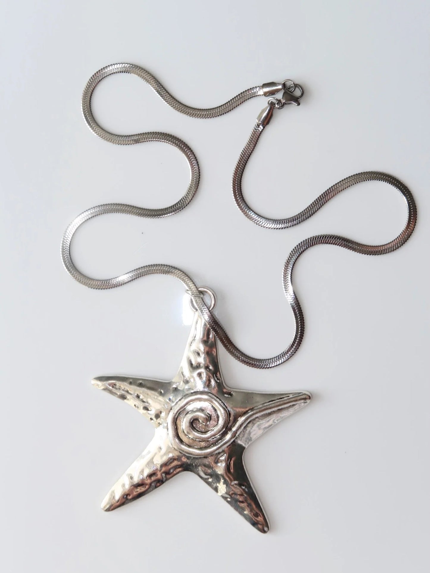 WISTERIA - Statement silver star necklace