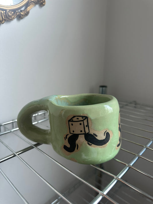 Dancing dice mug