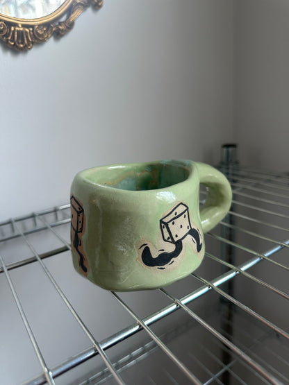 Dancing dice mug