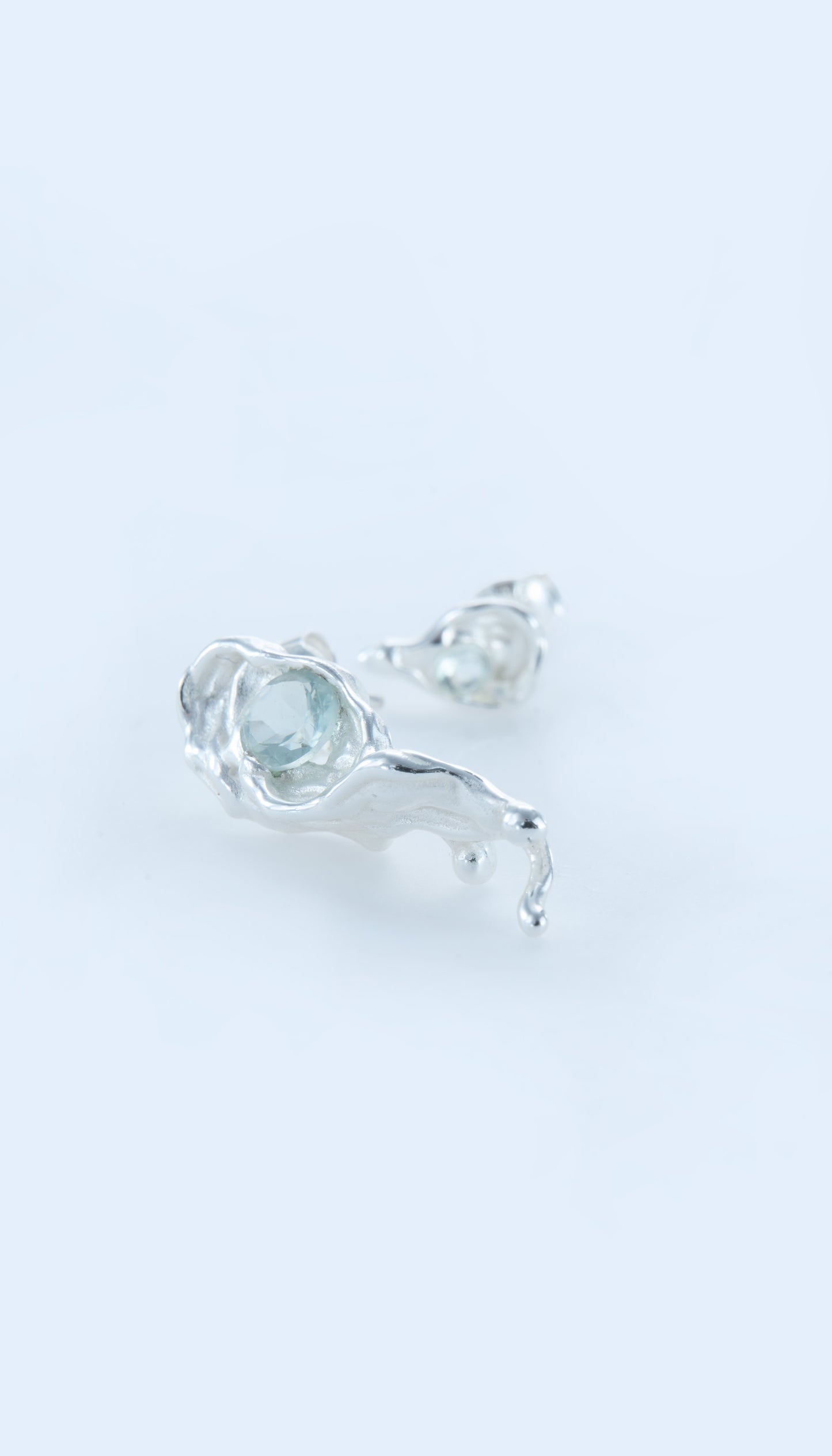 The Fluent Arc White Tear Earrings