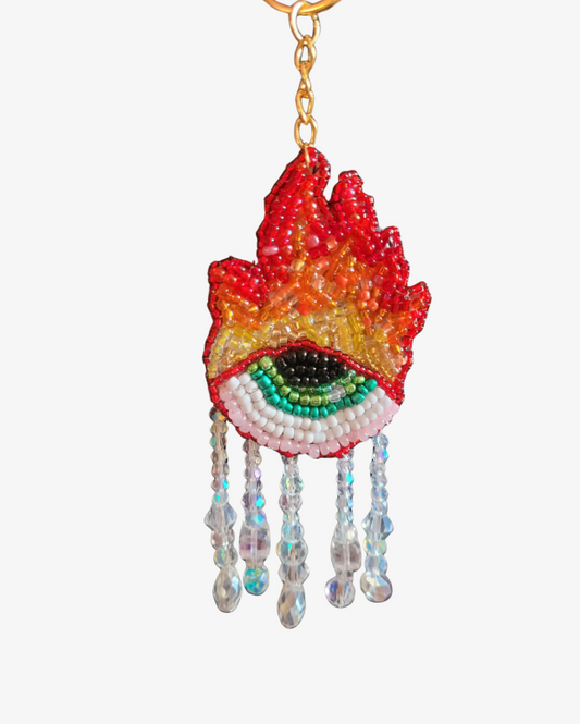 Taskepynt/ nøglering, burning eye